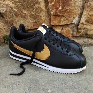 nike cortez mens black and gold